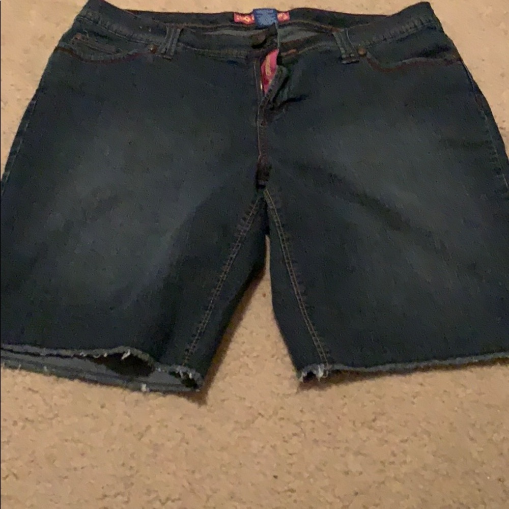Dark washed jean shorts.